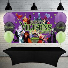 a table topped with balloons and an image of villain's party