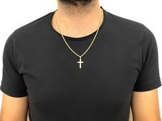 Gold Rope Chain Cross Necklace is a beautiful blend of elegance and spirituality, making it the perfect accessory for both men and women. Whether you're looking for a meaningful Christian Gift, a Men's Necklace, or a Christmas Gift to celebrate faith, this timeless piece is ideal for expressing both style and devotion. The versatile design allows you to choose between Women's Cross and Men's Cross options to find the perfect fit for anyone. This cross necklace is crafted in 925 sterling silver with a 14K Gold Filled finish, ensuring durability and long-lasting beauty. To further personalize your jewelry, you can select from multiple cross models or add a custom engraving to the back of the pendant. Make it uniquely yours or create a truly special gift for your loved ones. Important: Please Gold Cross Necklace With Rope Chain As A Gift, Gift Cross Pendant Necklace With Rope Chain, Yellow Gold Rope Chain With Cross Pendant Jewelry, Cheap Men's Cross-shaped Jewelry, Gold Cross Necklace Mens Jewelry1000.com, Mens Crosses, Gold Rope Chains, Men's Necklace, Religious Jewelry