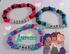 two bracelets with name charms on them sitting next to an image of cartoon characters