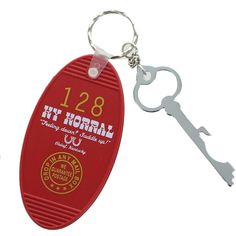 a keychain with a bottle opener attached to it's front and back sides