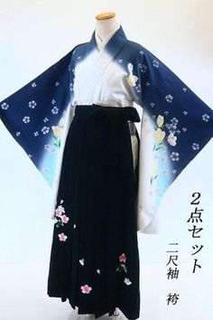 This nishaku-sode features a grayish-blue and white cherry blossom ground with cherry blossoms and tulips. The gold-plated finish gives this piece a chic yet glamorous atmosphere. Set includes Sleeve Hakama (lantern-shaped hakama) Kimono Body length (from the shoulder peak): approx. 111.0 cm (height given/impossible) Sleeve length: About 75.0cm Sleeve length: About 66.0 cm (the distance from the sleeve back to the end of the sleeve is not possible) Front width: about 25.0cm / Back width: about 29.5cm Hakama Under the cord: approx. 91.0cm Material: polyester Condition:Please see photos. ☆ Furisode" symbolizes youthfulness and glamour, and it is considered a garment to make oneself look beautiful. It is characterized by gorgeous designs with traditional Japanese patterns, expressing traditio Kimono Traditional, Furisode Kimono, Embroidery Kimono, Japanese Traditional Clothing, Kimono Japan, Long Sleeve Kimono, Traditional Kimono, Beautiful Kimonos, Japanese Embroidery