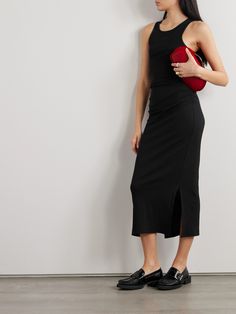 Perfect for casual days, GANNI's midi dress has countless styling options - wear it underpinning a blazer or by itself with sneakers. Made from a ribbed organic cotton-blend, it has sporty racerback straps and is subtly ruched at the hips. Don't miss the embroidered 'Butterfly' logo patch on the chest. Modern Black Midi Dress For Daywear, Versatile Midi Dress For Fall, Versatile Fitted Midi Dress For Spring, Fitted Versatile Midi Dress For Spring, Casual Ruched Midi Dress For Work, Versatile Knee-length Midi Dress For Work, Sleek Ruched Midi Dress For Spring, Versatile Fitted Midi Dress For Work, Casual Midi Dress For Evening