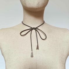 Fashion trend suede vegan leather choker necklace with bow 🌼 Choker length in 2 sizes,  small/ regular and large/ extra large (12" and 14" ) just choose for perfect fit ( your neck size)  🌼 Made of soft vegan suede leather 🌼 The bow is already attached to the choker, no need to tie yourself ( it is handsew, not glued)  🌼Adjustable -- Lobster clasp closure with 3" adjustable extension chain - will fit perfect on your neck 🌼 with silver gray end cords accesories 🌼 For special sizes please message me It is perfect to wear with corset, evening, party or prom dress, also a perfect romantic gift.  Find more accessories here in my shop : https://www.etsy.com/shop/HouseOfTooFan Please note that due to lighting effects, monitor's brightness, contrast and other settings, there might be some sl Adjustable Brown Trendy Choker, Trendy Adjustable Brown Choker, Brown Adjustable Choker, Fall Color Trend, Bow Choker, Leather Choker Necklace, Leather Chokers, Fall Color, Romantic Gift