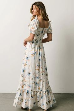 This stunning print maxi dress with effortless flow and smocked bodice has all the hues of a warm, spring day. The tiered skirt mixed with a slight bubble sleeve have us ready for the season change! Sunday Dresses, Season Change, Smocked Maxi Dress, Maxi Dress White, Baltic Born, Bubble Sleeve, Smocked Dress, Maxi Dress Blue, Maxi Wrap Dress