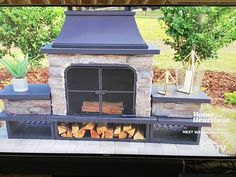 an outdoor fireplace is shown on the tv screen