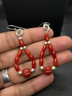 Beautiful Coral Dangle & Drop Silver Earrings-Red Coral Silver Earring-Italian Drum And Melon Shape Beads Earring For Women Best Jewellery   About Item :- Materiel: German  Silver Shape :- Melon & Tube  Stone : Natural Red Cora Earring Length:- 62MM Earring Width:- 20 MM Earring Depth :- 6MM Earring Weight:- 32 Carat  Approx. Payment policy We accept the payment via PayPal only. Shipping policy We Ship the item as per our shipping policy once we receive the payment. We understand that getting your items quickly is important to you, so we make every effort to process your orders quickly. Return policy We accept the return within 30 days and item should be return in original condition without any damage and broken. We are continuously adding new products in our shop. So keep coming back to s Artisan Earrings With Polished Beads For Gift, Artisan Polished Beads Earrings As Gift, Artisan Red Teardrop Earrings, Artisan Polished Beads Earrings For Gift, Elegant Dangle Beaded Earrings With Polished Beads, Elegant Dangle Earrings With Polished Beads, Elegant Polished Beads Dangle Earrings, Elegant Polished Beaded Dangle Earrings, Sterling Silver Earrings With Polished Beads