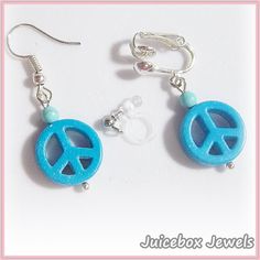 Blue Peace Sign Dangle Earrings  1 Pair Plastic Clip-on Earpiece or choose metal clips or fish hook type for pierced ears.  Approx. Size: 1  inch long (drop size).  Get the look of pieced without having your ears pierced. They are so lightweight you will forget you are wearing earrings.  See the picture(s) for more details. Not recommended for very young children due to choking hazards.  Handmade to Order  Handle with care, do not pull the earpiece too far apart when putting them on. To tighten see the photo/photo card included with the purchase. The additional shipping charge, when combined with another item, is 25 cents (Combined Payment Only) Visit my Etsy Shop: https://www.etsy.com/shop/JuiceboxJewels I do not take returns/exchanges on earrings for hygienic reasons. Blue Metal Clip-on Jewelry, Blue Metal Clip-on Earrings, Adjustable Clip-on Drop Earrings Jewelry, Blue Clip-on Earrings As Gift, Blue Clip-on Drop Earrings, Adjustable Clip-on Drop Earrings, Blue Jewelry With Lobster Clasp For Summer, Summer Blue Hypoallergenic Jewelry, Adjustable Light Blue Earrings