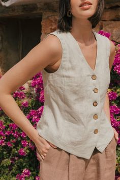 Made with 100% certified European linen OEKO TEX certified Stone washed for maximum softness Sleeveless button-down Made in Vilnius, Lithuania Made from premium linen fabric, the Greta Linen Vest ensures comfort and breathability throughout the day. Perfect for layering or wearing on its own, it offers endless styling possibilities for both casual and formal occasions. Pair with the Leah Wide Linen Pants With Slits, Barbora Straight Linen Pants, Ciara Linen Slip Skirt, or Mona Long Linen Skirt. Wide Linen Pants, Maternity Nightwear, Linen Vest, Skirt Model, How To Dress A Bed, Vilnius Lithuania, Nightwear Women, Short Kimono, Slip Skirt