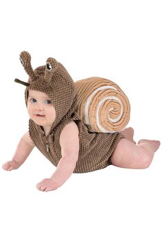 a baby is wearing a snail costume