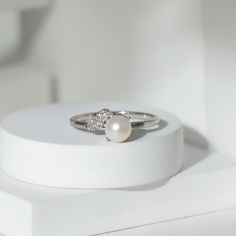 Product Details Make a statement with the stunning Freshwater Pearl Ring, a classic design featuring a round-cut Freshwater Pearl delicately set in a prong setting and accented with sparkling Diamond. A perfect symbol of commitment and love, this Freshwater Pearl Ring is a great choice to celebrate your special bond with your partner while highlighting your unique sense of style. Product Information SKU SHP-RINGS072210057 Weight 2.00 gm (Approximate) FRESHWATER PEARL INFORMATION No.of Stones 1 P Luxury Pearl Ring With Diamond Accents For Promise, Luxury Diamond White Pearl Ring For Promise, Luxury Diamond White Pearl Promise Ring, Diamond White Pearl Ring With Diamond Accents For Promise, White Gold Pearl Ring With Diamond Accents For Promise, Timeless White Gold Pearl Ring With Diamond Accents, Elegant Diamond Pearl Ring For Promise, Elegant White Gold Pearl Promise Ring, Elegant Diamond Pearl Promise Ring