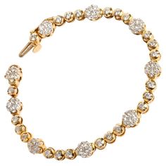 A unique piece within our carefully curated Vintage & Prestige fine jewellery collection, we are delighted to present the following: This pretty Diamond Daisy Bracelet is set in 14K Yellow Gold wit 3.75ct in diamonds. The bracelet measures 160mm. A perfect gift for her. Vintage Round Brilliant Cut Diamond Bracelet, Vintage Round Bracelet With Single Cut Diamonds, Dazzling Diamond Bracelet With 17 Jewels For Anniversary, Exquisite Single Cut Diamond Anniversary Bracelets, Hallmarked Yellow Gold Diamond Tennis Bracelet, Hallmarked Round Gold Bracelet, Dazzling Round Diamond Bracelet With 17 Jewels, Hand-set Yellow Gold Diamond Bracelet For Anniversary, Yellow Gold Diamond Bracelet Hand Set For Anniversary