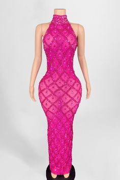 More colors available! You'll be the center of attention in this sheer transparent dress dripping in rhinestones and featuring a coordinating sequin crisscross pattern. Available in multiple colors! Perfect for your special night! Pink Embellished Sequin Dress For Prom Season, Pink Embellished Sequin Fabric For Prom Season, Pink Embellished Sequin Dress For Homecoming, Sleeveless Sequin Dress With Rhinestones For Homecoming, Fitted Sequin Fabric With Rhinestones For Prom, Pink Sequin Fabric For Homecoming And Prom, Sequin Dress With Rhinestones For Prom Season, Embellished Stretch Sequin Dress For Party Season, Stretch Embellished Sequin Dress For Party Season