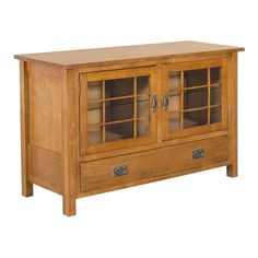 a wooden cabinet with glass doors and drawers