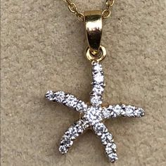 14kt Yellow Gold Swimming Starfish Pendant W/ .34 Ct’s Diamonds. This Is A Great Pieceto Weareveryday Or To Remind You Offavorite Times At The Beach. Starfish Are A Symbol Of Good Luck! Is From A Fine Jewelry Store In Key West. Was Listed For $1150. Selling Here For $695 Amazing Price! Genuine Diamonds Si1-Si2 Gh Color. Very Lively Diamonds. Also Available In Rose & White Gold. Last Three Pics Are White Gold Pendant Only In This Listing. Chain Is Not Included But Can Be Sold Separately. Luxury Starfish-shaped Jewelry Gift, Elegant Jewelry With Starfish Charm, Elegant Star-shaped Jewelry With Starfish Charm, Elegant Yellow Gold Starfish Necklace, Elegant Starfish Charm Pendant Jewelry, Elegant Yellow Gold Necklace With Starfish Charm, Elegant Starfish Charm Jewelry For Anniversary, Elegant Yellow Gold Necklaces With Starfish Charm, Elegant Pendant With Starfish Charm