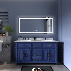 a bathroom with blue cabinets and white counter tops is shown in front of a large mirror