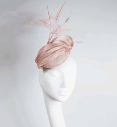 A blush pink hand blocked sinamay pillbox. Trimmed with blush silk abaca and shaped feathers. A captivating headpiece delicately elegant. Meets Royal Ascot Royal Enclosure size requirements. Secured with hat elastic. This hat can be made in other colours processing time 5-7 days please enquire. Blush Pink Fascinator, Mother Of The Bride Hats, Hat Tea Party, Royal Ascot Hats, Pink Fascinator, Ascot Hats, Bride Hat, Tea Party Hats, Kentucky Derby Hat