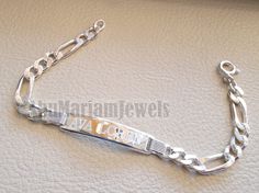 Men silver bracelet Palestine laser engraving or any personalized name sterling silver 925 man gift with nice box chain and plate style Bracelet length : 20 cm ( 8 Inches ) Plate width : 9 mm Customized name or word / words (10 -12 letters maximum ) Approximate weight : 15 grams please write in the notes the name with the order and if different bracelet length needed . Classic Silver Name Bracelet With Polished Finish, Classic Silver Name Bracelet, Hallmarked, Silver Name Bracelet With Engraving For Anniversary, Classic Silver Hallmarked Name Bracelet, Silver Name Bracelet With Polished Finish As Gift, Silver Engraved Name Bracelet For Anniversary, Silver Name Bracelet With Polished Finish, Engraved Silver Name Bracelet For Anniversary, Elegant Silver Rectangular Name Bracelet