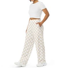 These wide-leg pants have an adjustable waist and are made with soft, stretchy fabric.  * Relaxed unisex fit * Practical side pockets * Elastic waistband with a white drawstring * Can be worn on the waist or on the hips * Premium knit mid-weight jersey fabric * 95% polyester, 5% elastane * Fabric weight: 6.19 oz/yd *item designed by me & printed by Printful Trendy White Pants With Side Pockets, White Straight Leg Cargo Pants With Elastic Waistband, Sporty White Wide Leg Cargo Pants, Casual White Pants With Side Pockets, Trendy White Wide-leg Parachute Pants, Casual White Wide-leg Parachute Pants, White Casual Cargo Pants With Elastic Waistband, White Casual Cargo Pants For Loungewear, Casual White Parachute Pants With Elastic Waistband