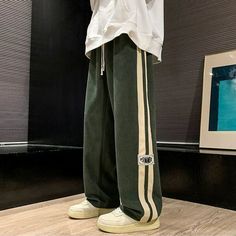 Step up your street style with these Japanese Corduroy Straight Sweatpants. Crafted from 100% cotton, these mid-rise pants feature a drawstring waistband and regular fit for a comfortable fit. Add a bold touch to any outfit with this risk-taking streetwear. Features: -100% Cotton -Mid-rise Waist -Drawstring Waistband -Regular Fit -Street Style Straight Sweatpants, Men Pants, Free Socks, Corduroy Fabric, Fashion App, High Fashion Street Style, Men's Sweatpants, Khaki Green, Mens Sweatpants