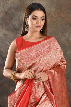 Be vision of elegance on special occasions in this traditional red silk saree. The saree is enhanced with overall heavy zari work. It comes with a matching blouse piece. Disclaimer: The shown stitched blouse on the model is for display purpose only. The saree comes with a matching blouse piece and finished with fall and piko. Red Silk Saree, Sarees Banarasi, Fashion Journals, Banarasi Saree, Zari Work, Indian Saree, Traditional Fabric, Silk Sarees Online, Saree Online