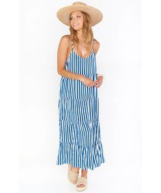 This favorite strappy dress is now in a maxi length! The Caroline Maxi Dress is a vacation must have with her breezy blue and white striped fabric, adjustable straps, and perfectly tiered flow! Product Details *Lightweight drapey fabric - 100% Polyester*Adjustable straps*53" from shoulder to hem Model & Fit Sophia is 5'9 and wearing size x-large / Bri is 5'8" and wearing size small Bell Bottoms And Sweater, Kimono Crop Top, Maternity Dress Outfits, Maternity Bridesmaid Dresses, Boho Maternity, Plus Size Bridesmaid, Romper And Jacket, Strappy Dress, Bridesmaid Dresses Plus Size