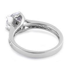 Top of Ring Height: 7.5mm

Top of Ring Width: 7.5mm

Shank Width: 2.4mm


Stone Material: Clear Cubic Zirconia

Center Stone Size: 7.5mm

Stone Shape: Round

Center Stone Carat Weight: 1.67 ct.

Total Number of CZ Stones: 15

Stone Setting: Prong


Metal: 925 Sterling Silver

Plating: Rhodium plated

Finish: High Polish Classic Heart Ring With Vvs Clarity, Classic Heart Ring With High Clarity, Cubic Zirconia Heart Ring With Prong Setting, Cubic Zirconia Heart Ring With Brilliant Cut For Promise, Cubic Zirconia Heart Ring With Center Stone, Formal Heart Ring With Center Stone In Cubic Zirconia, Promise Heart Ring With Prong Set Cubic Zirconia, White Gold Heart Ring With Cubic Zirconia, Round Cut, Cubic Zirconia Heart Ring With Prong Setting For Promise