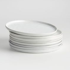 white plates stacked on top of each other