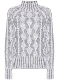 a white sweater with an intricate pattern on the shoulders and neck, made out of yarn