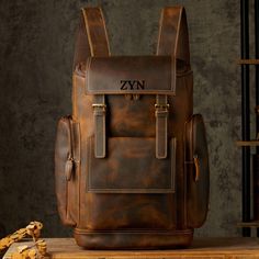 Full grain Leather Backpack Men, Handmade Hiking Bag, Knapsack Large Capacity Laptop backpack, Rucksack Retro School Bag Key Features: Material:🐄 Main Material: GENUINE LEATHER, ensuring durability and a premium feel. 🎨 Lining Material: Acrylic, offering a smooth and sturdy interior. Style:🏍 Style: Moto & Biker, perfect for a rugged and stylish look. Usage:🎒 Use: Backpack, ideal for various occasions including school, work, or travel. Specifications: 📏 Size: 44CM * 31CM * 15CM / 17.3in * 12 Leather Travel Backpack, Vintage Leather Backpack, Leather Backpack For Men, Mens Backpack Travel, Moto Vintage, Vintage Man, Brown Leather Backpack, Hiking Bag, Laptop Rucksack