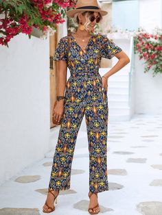 Printed V-Neck Flutter Sleeve Jumpsuit Multicolor Stretch V-neck Jumpsuits And Rompers, Summer Printed V-neck Jumpsuit, Summer Printed V-neck Jumpsuits And Rompers, Fitted Printed V-neck Jumpsuits And Rompers, Summer Vacation Jumpsuits With Surplice Neckline, Spring Beach Jumpsuits With Surplice Neckline, Summer Vacation Jumpsuits And Rompers With Surplice Neckline, Beach Jumpsuits And Rompers With Surplice Neckline For Spring, Chic Multicolor V-neck Jumpsuit And Romper