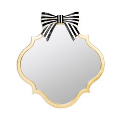 a mirror with a bow on it