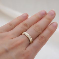 Handcrafted in 14K yellow gold, this trendy grooved band ring is great for any occasion. Easily stackable with any of our stacking rings or wear alone as a statement ring or alternative wedding band. Made to Order. Ships within 3-4 weeks. - Band width: 4mm - Finish: Yellow, Rose Gold, and White - Made in 14 karat gold.- Stamp with 14K. Minimalist Gold Baguette Cut Stackable Rings, Minimalist Baguette Cut Gold Stackable Rings, Gold Baguette Cut Minimalist Rings, Minimalist Gold Baguette Cut Ring, Everyday Stackable Rings With Baguette Cut, Modern Gold Stackable Rings With Baguette Cut, Modern Gold Baguette Cut Stackable Rings, Alternative Wedding Bands, Gold Band Ring