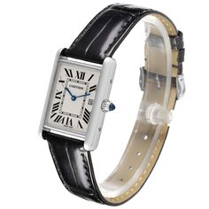 Cartier Tank Louis Large White Gold Black Strap Mens Watch W1540956. Quartz movement. 18k white gold case 25.0 x 33.0 mm. Circular grained crown set with the blue sapphire cabochon. . Scratch resistant sapphire crystal. Silvered grained dial with black Roman numeral hour markers and an inner minute track. Sword-shaped blued hands. Date calendar at the 3 o'clock aperture. Secret Cartier signature at VII. Black leather strap with a Cartier 18K white gold tang buckle. Cartier Tank Louis, Sapphire Cabochon, Patek Philippe Aquanaut, Rolex Air King, Cartier Tank, Vintage Watches For Men, Date Calendar, Roman Numeral, Gold Case