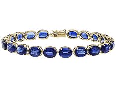 27.71ctw Oval Kyanite, 14k Yellow Gold Tennis Bracelet. Measures Approximately .24"W. Box Clasp With Safety Formal Oval Gemstone Tennis Bracelet, Oval Gold Bracelet With Gemstone For Formal Occasions, Oval Gold Gemstone Bracelet For Formal Occasions, Formal Oval Gold Bracelet With Gemstones, Formal Oval Gold Gemstone Bracelet, Formal Oval Gold Bracelet, Formal Oval Faceted Jewelry, Oval Tennis Bracelet For Formal Occasions, Gold Tennis Bracelet