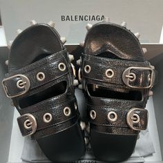 Balenciaga Cagole Sandals Only Worn Twice And In Pristine Condition Size 39 Fits A U.S. Women’s Shoe Size 8 Or 9 Comes With Original Box And Dust Bags Which Have Never Been Used Designer Studded Open Toe Sandals, Edgy Black Sandals With Studs, Edgy Black Studded Sandals, Luxury Studded Round Toe Sandals, Luxury Studded Sandals With Round Toe, Designer Leather Sandals With Studs, Designer Studded Leather Sandals, Luxury Sandals With Spikes And Round Toe, Luxury Spiked Round Toe Sandals