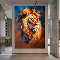 a painting of a lion is hanging on the wall