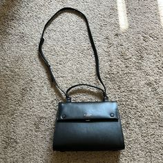 Worn Only Once! Bradley London Handbag In Black. It Has A Crossbody Strap (Adjustable) With A Handle. Has A Flap To Close And Open The Bag. Has 2 Zippered Pockets. Comes With Cover Bag Black Satchel Flap Bag With Adjustable Handle, Black Flap Bag With Double Adjustable Handle, Black Crossbody Flap Bag With Adjustable Handle, Black Crossbody Satchel With Adjustable Handle, Black Shoulder Bag With Adjustable Handle For Evening, Classic Black Flap Bag With Adjustable Handle, Elegant Black Flap Bag For On-the-go, Chic Black Flap Bag With Adjustable Handle, Black Top Handle Flap Bag With Adjustable Handle