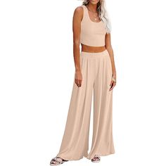 Elevate your fashion game with our Crop Top Long Sleeve Palazzo Pants Set. This stylish ensemble combines comfort and chic, making it a versatile addition to your wardrobe. Whether you're dressing up for a special occasion or looking for a stylish yet comfortable outfit for a casual day out, this set has you covered. The long sleeves provide added versatility, making it suitable for different seasons and settings. Specification: Unshrinkable, wrinkle-resistant fabric, always maintains its shape Summer Solid Color High-waisted Pants Set, Solid Color High-waisted Pants Set For Summer, Solid High-waisted Pants Sets For Summer, Chic Spring Wide Leg Pants Solid Color, Summer Sets With Solid High-waisted Pants, Chic Sets With Solid Color Long Pants, Chic Solid High-waisted Pants Set, Chic Solid Color Sets With Long Pants, Chic Solid Color Bottoms For Going Out