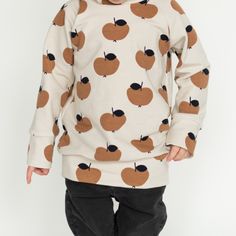 This versatile and comfortable sweatshirt is the perfect wardrobe staple. With its large hood and fun print, your little one will want to wear it every day! Made from high quality organic French Terry fabric sourced from Sweden, it won't fade, pill, or lose its shape. We love these in every print and color and they are all handmade in Battle Ground, WA. 95% cotton 5% lycra. Machine wash cold, hang to dry for long lasting goodness Playful Crew Neck Hoodie For Fall, Playful Sweatshirt With Ribbed Cuffs For Loungewear, Playful Long Sleeve Winter Sweatshirt, Organic Cotton Long Sleeve Loungewear Sweatshirt, Organic Cotton Long Sleeve Tops For Fall, Cute Long Sleeve Hoodie With Graphic Print, Organic Cotton Loungewear Sweatshirt, Oversized Long Sleeve Organic Cotton Tops, Playful Long Sleeve Sweater With Relaxed Fit