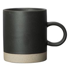 a black and white coffee cup on a white background