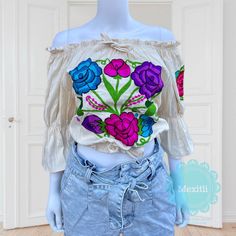 "Beautiful Mexican off the shoulder bell sleeve floral embroidered crop top with elastic around the waist and shoulders. Made out of manta, 100% cotton. Please note: Each top is unique, the embroidery may be slightly different from the one pictured. Dimensions: Small Bust- 38\" Length- 16\" Medium Bust- 41\" Length- 16\" 🧵Made in Chiapas, Mexico. 🧺Care Instructions: We recommend hand washing, air dry. 📲Please feel free to message me with any questions regarding sizing and fit. Additional phot Fitted Bohemian Off-shoulder Top For Spring, Summer Festival Crop Top With Floral Embroidery, Spring Festival Off-shoulder Blouse, Bohemian Crop Top With Floral Embroidery For Summer, Bohemian Floral Embroidered Crop Top For Festival, Bohemian Crop Top With Floral Embroidery, Embroidered Fitted Bohemian Crop Top, Bohemian Floral Embroidery Crop Top For Festival, Fitted Embroidered Bohemian Crop Top