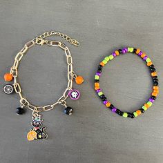 This Is A Two Stretch Bracelet Set That Includes: 1) Black Cat With A Wizard Witch Hat & Jack-O'-Lantern Pumpkin Metal Enamel Pendant Paper Clip Chain Bracelet. Bracelet Has Orange & Black Faceted Beads As Well As Spider And Candy Corn Beads 2) Black, Green, Purple, And Orange Bead Stretch Bracelet Many Other Halloween Themed Bracelet Sets As Well As Jewelry, Headbands, And Hair Accessories Available In Boutique. Join My Live Shows On Wednesday And Sunday At 5 Pm Pacific To See Unique Accessorie Halloween Beaded Bracelet Ideas, Halloween Bead Bracelet Ideas, Spooky Bracelet Ideas, Halloween Beaded Bracelet, Halloween Bracelet Ideas, Fall Bracelets, Halloween Jewelry Diy, Halloween Beaded Jewelry, Corn Bead