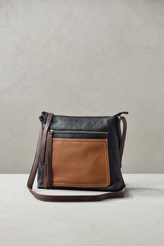 Handcrafted with care to tote all your essentials with ease, the Mira leather crossbody bag will quickly become an everyday favorite. It's made from full-grain Italian cowhide with a luxurious pebble grain, as lovely to the touch as it is durable. This fully lined purse features multiple pockets inside and out to protect and organize your daily goods. Pebbled Leather Crossbody Shoulder Bag For On-the-go, Brown Pebbled Leather Hobo Bag For Everyday, Brown Pebbled Leather Hobo Bag For Travel, Versatile Pebbled Leather Shoulder Bag For Daily Use, Versatile Crossbody Bag With Leather Lining, Versatile Bag With Adjustable Strap And Pebbled Leather, Versatile Pebbled Leather Bag With Adjustable Strap, Textured Leather Crossbody Satchel For Fall, Brown Pebbled Leather Bag For Everyday Use