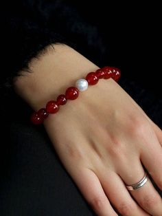 Passionately believe in the value of our Baroque Pearl Red Onyx Bracelet! This stunning piece exudes energy and inspires strong emotions, making it a must-have accessory that will elevate any outfit. Adorned with unique baroque pearls and red onyx stones, this bracelet will add a touch of excitement to your look. Don't miss out on this incredible piece! Metal: 18K Recycled Gold Plated On Brass Gemstone: Red Agate/Freshwater Baroque Pearl Pearl/Agate Dimensions: 6mm(9-9.5mm)(8mm/10mm) Bracelet Le Elegant Red Agate Beaded Bracelets, Elegant Red Carnelian Beaded Bracelets, Red Gemstone Bracelets As Gift, Red Gemstone Bracelets For Gift, Elegant Red Stretch Bracelet With Gemstone Beads, Elegant Red Gemstone Beads Stretch Bracelet, Elegant Red Agate Bracelets, Red Agate Healing Jewelry, Elegant Red Stretch Bracelet With 8mm Beads