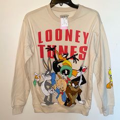 a long sleeved shirt with cartoon characters on it