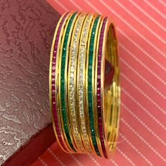 Elegant Bangle For Navratri Gift, Elegant Bangle For Navratri, Elegant Gold Bangle For Navratri, Elegant Bangle For Diwali Celebration, Festive Formal Jeweled Bangle, Festive Jeweled Bangle For Formal Occasions, Elegant Gold Bracelet For Navratri, Kundan Multicolor Bangle, Elegant Gold Bracelets For Navratri