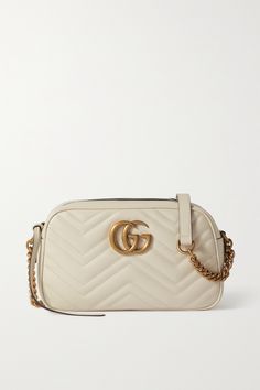 The interlocking 'GG' hardware on Gucci's bag is inspired by a '70s belt buckle from the brand's archives. This quilted leather style has a suede-lined interior spacious enough to carry a compact, wallet and keys. Wear yours cross-body by the chain-trimmed shoulder strap. Cute Gucci Bags, Wishlist Board, Safari Look, Limousine Car, Bright Bag, Best Designer Bags, Givenchy Bag, Satin Blazer, Gucci Gg Marmont