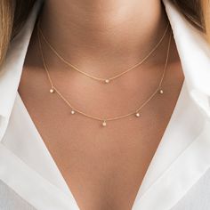 Our sparkling solitaire necklace features 1 round brilliant cut natural VS quality diamond prong set in a unique 6 prong setting along with a sturdy 1.3mm cable chain and spring clasp all in 14K Solid Gold. Perfect for layering or just to add some sparkle to your neckline this necklace makes the perfect accessory! ✨ Features ✨ • Ready To Ship • Made in the USA.• Gold : Solid 14K, 1.3mm Cable chain• Choice of Gold: Yellow Gold, White Gold• Gem Stone: Genuine and Natural White Diamond• Diamond Cut Accessories Layering, Diamond Necklace Gift, Dainty Jewelry Necklace, Anniversary Necklace, Pendant Necklace Simple, Stackable Jewelry, Layering Necklaces, Simple Diamonds, Diamond Jewelry Designs