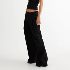 Low-Rise Tailored Pants Belt Looped Waist, Four Classic Pockets, Zip And Button Fastening, Wide Leg Non-Stretch Material, Unlined 100% Cotton Cold Hand Wash Edgy Cotton Straight Pants, Edgy Cotton Straight Leg Pants, Chic Cargo Pants With Belt Loops, Fitted Black Work Pants With Cargo Pockets, Fitted Black Cargo Work Pants, Edgy Black Wide-leg Pants, Chic Baggy Bottoms With Cargo Pockets, Edgy High-waisted Cargo Pants For Spring, Edgy High-waisted Spring Cargo Pants