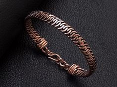 "Handmade serpentine weave braided hammered wire wrapped copper men cuff bracelet, unisex bracelet . Copper is oxidized to give it an antique appearance . Please read about copper care on Info & Faq section. Width : 0.8 cm - 0,3 \" The requested piece it's made to order similar with the original shown item , I always do by best for a similar look . Please be sure to read the entire description of the item before you purchase. Item images may seem larger due to close up shots ,if you have any que Mens Copper Bracelet, Birthday Men, Copper Accessories, Turquoise Men, Unique Gifts For Dad, Men Bracelets, Braids With Weave, Wire Wrapped Bracelet, Copper Cuff